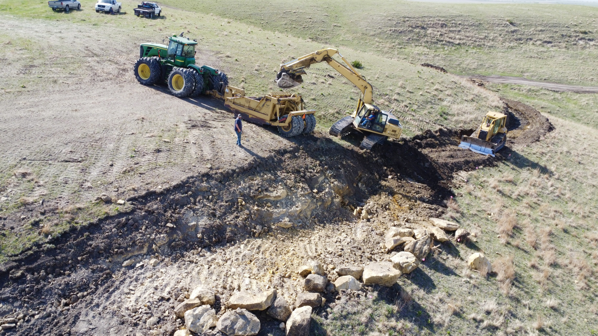 crane pickign up rocks